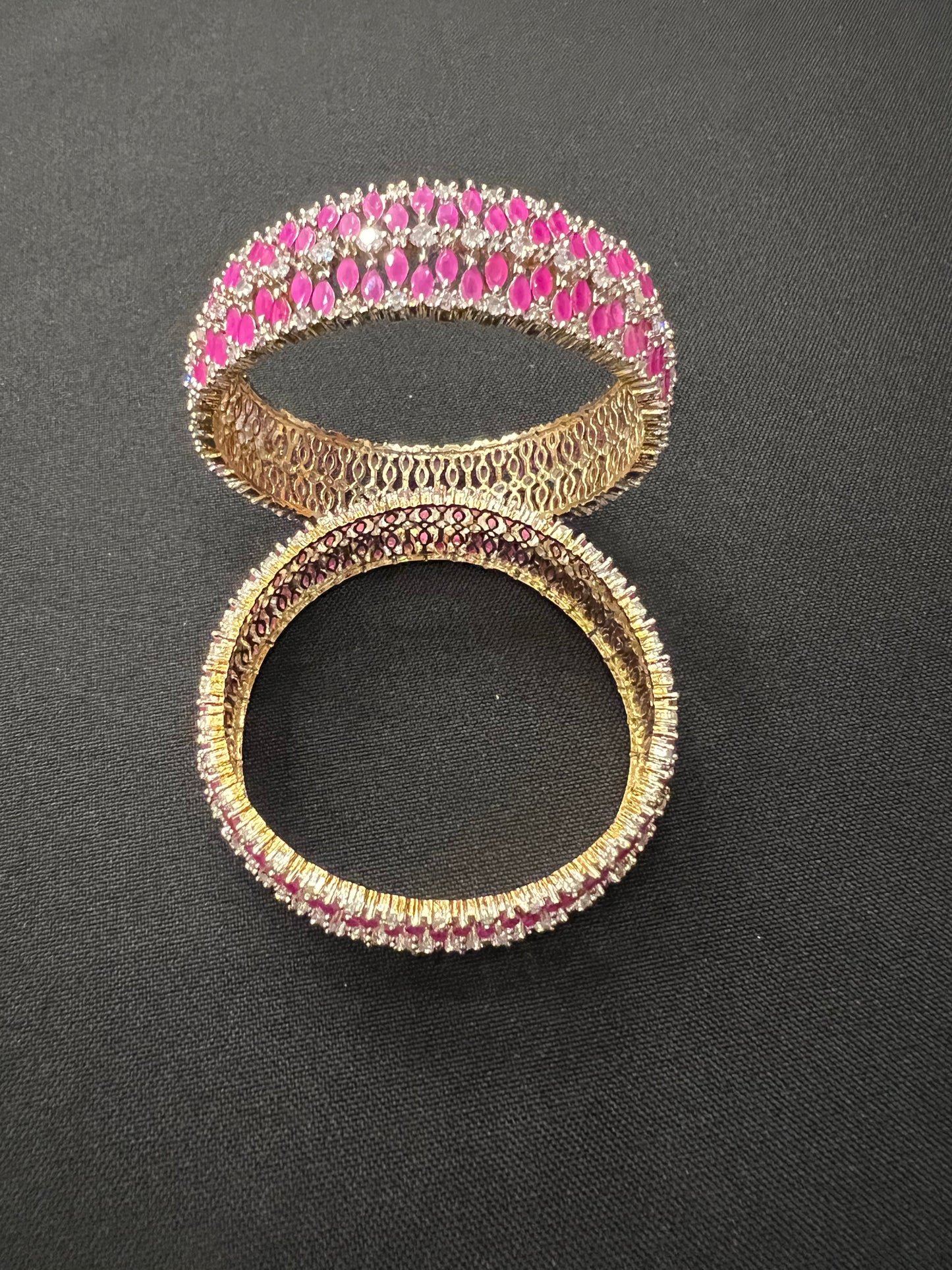 Load image into Gallery viewer, Pink and stoned bangles on gold base
