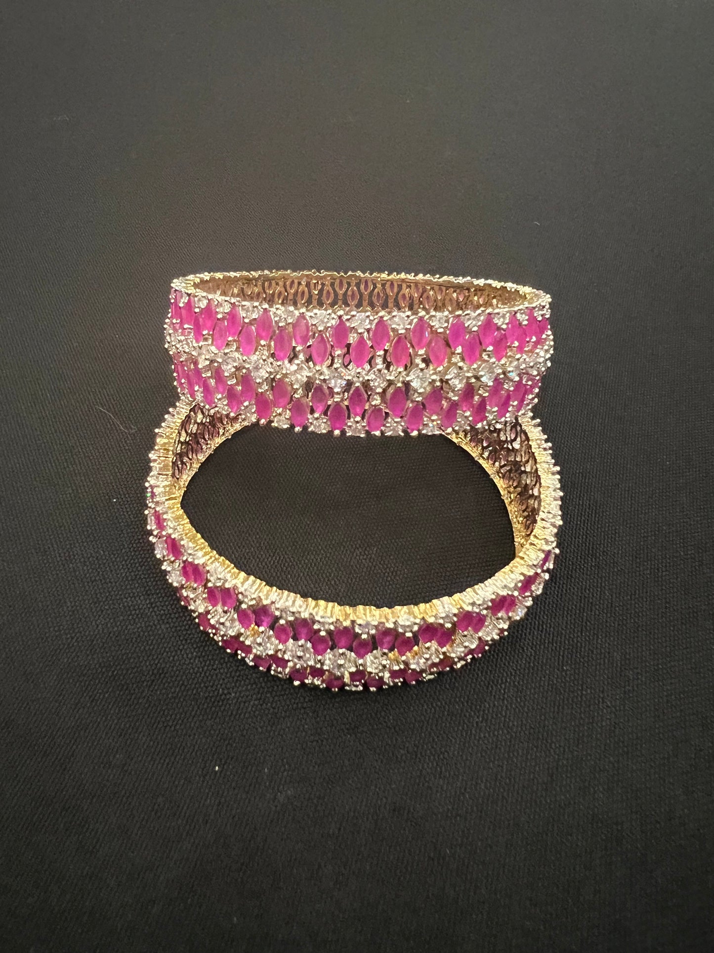 Load image into Gallery viewer, Pink and stoned bangles on gold base

